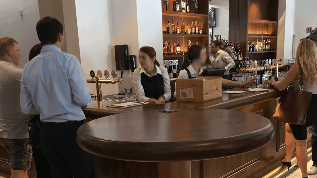 Port Office Hotel Front Bar with lots of people around | Featured Image for Tribella Group